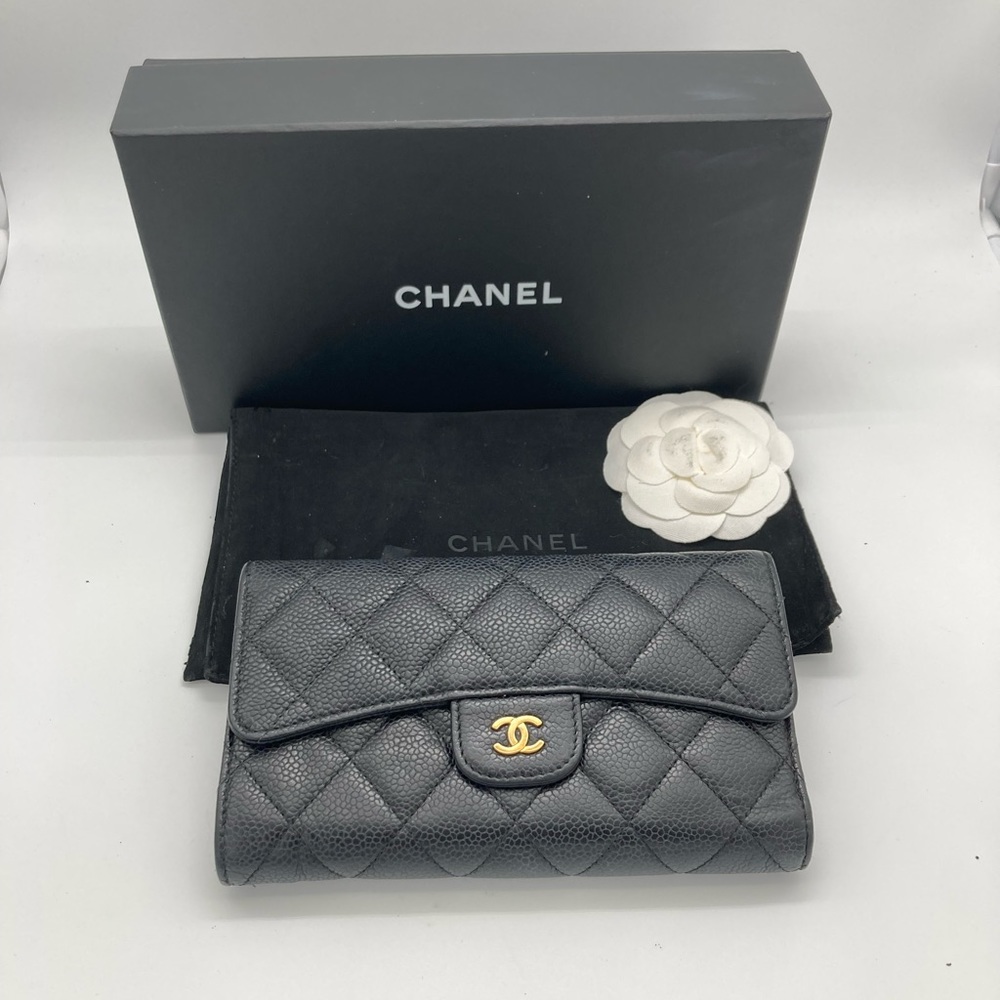 CHANEL Black Quilted Wallet with Gold Logo